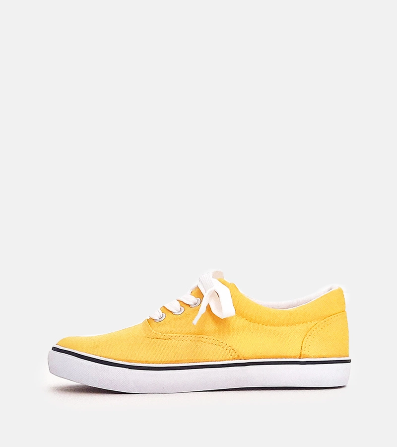 Żółte dziecięce tenisówki na sznurówkach Bollis