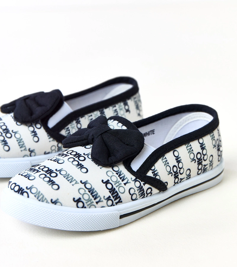 Białe tenisówki dziecięce z kokardką Missi